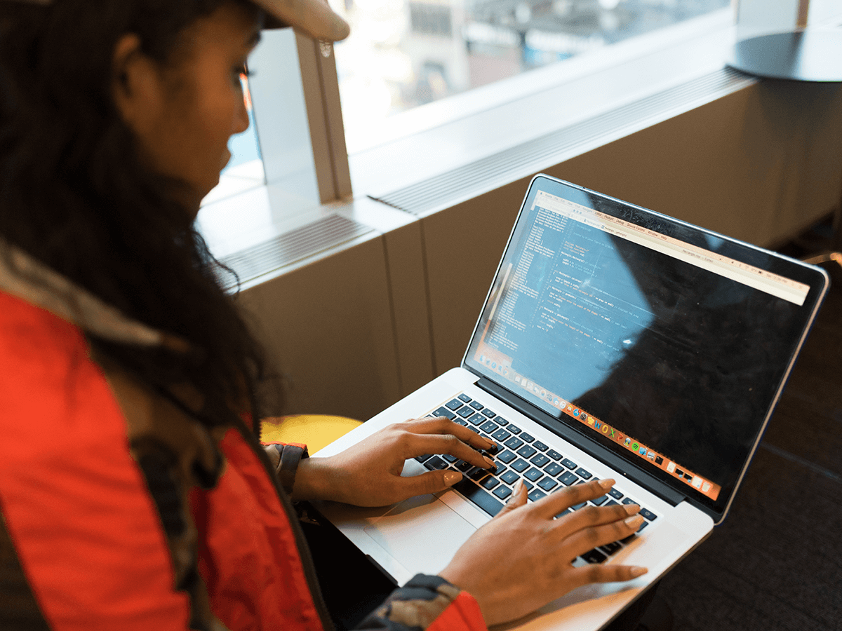 remote software engineer coding a program