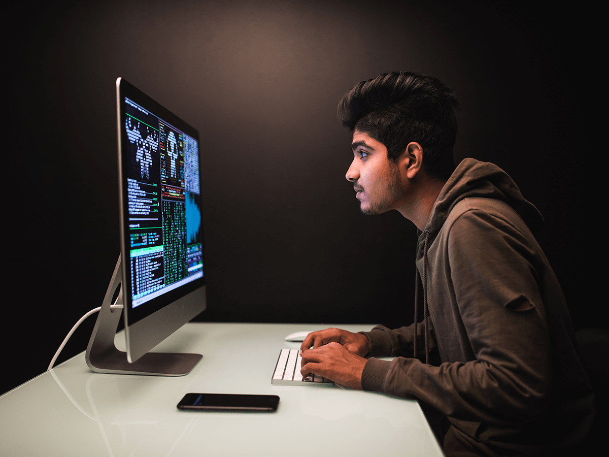Cyber security technician implementing strong protocols and access controls in an organisation. 