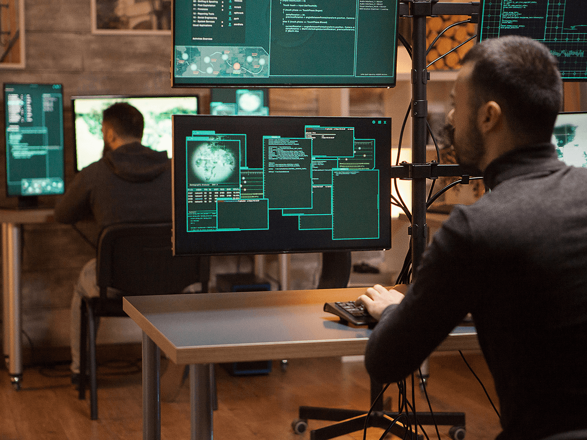 Tech professionals taking advantage of technology and forensics in cyber security.