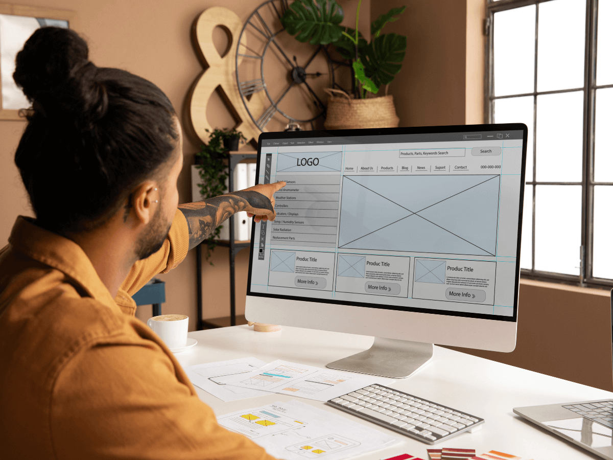 Web designer navigating dashboard and interfaces with Figma.