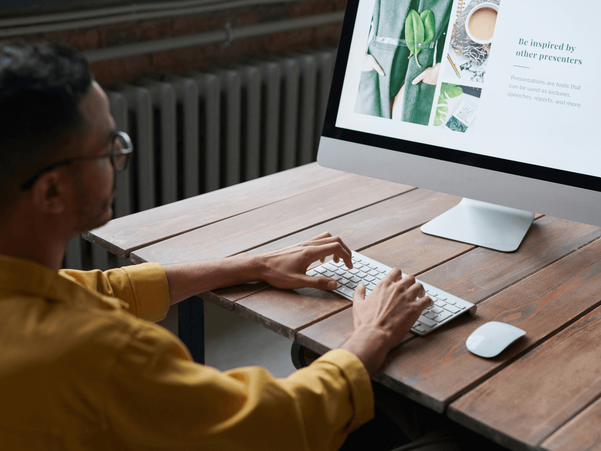 Web designer overcoming challenges in UX with design principles.